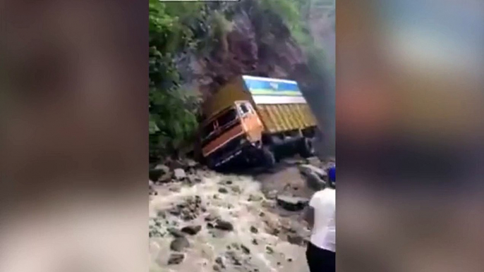 And you thought your commute was bad! Watch truck negotiate possibly the world's worst road