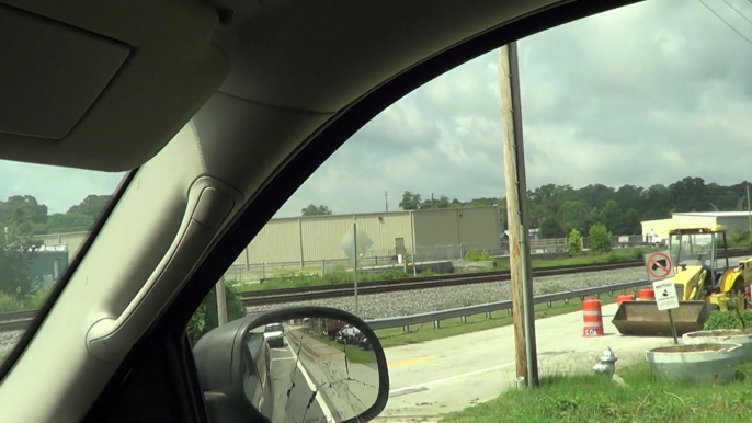 8-12-14 12:05 PM BNSF power leads NS 734 Coal Train SB through Austell Ga.