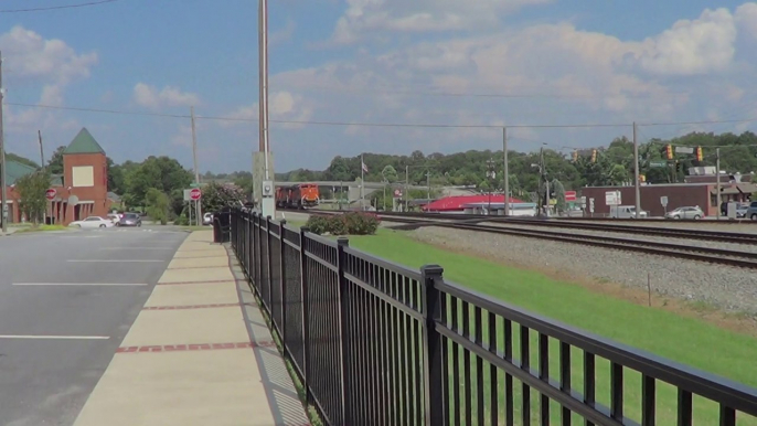 8-12-14 3:59 PM BNSF power leads NS 739 Coal Train NB and UP power leads NS 23n  intermodal train NB through Austell Ga.