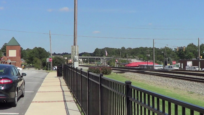 8-26-14 3:21 PM BNSF power leads NS G90 NB through Austell Ga.