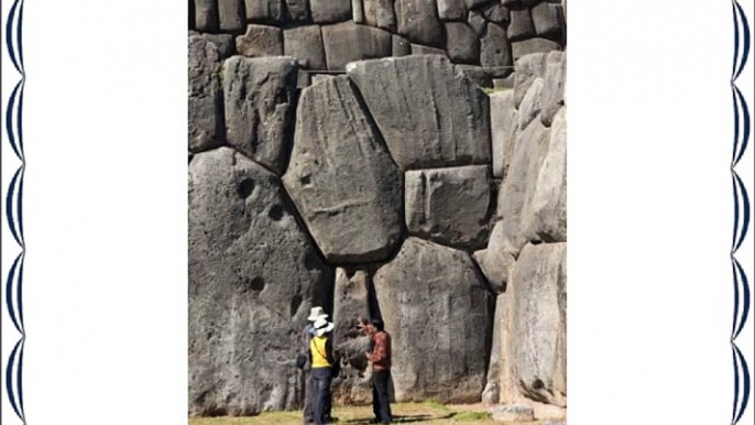 Guide talking to tourists at the Inca fortifi - 30 x 20in Canvas Print - Framed and ready to