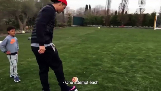 Cristiano Ronaldo teaches his son how to kick free kicks