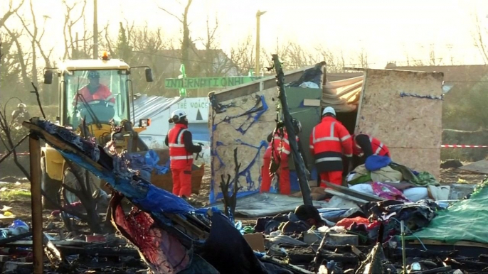 Migrants sew lips shut in protest at Calais 'jungle' camp