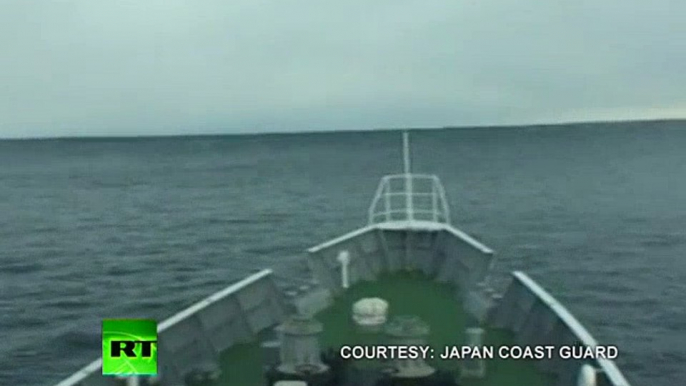 Tsunami Climbing: Incredible video of ship heading into wave in Japan  Disastrous Earthquakes