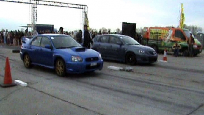 Subaru Impreza WRX STI Vs. Mazda 3 MPS Drag Race