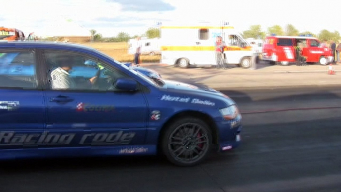 BLB's Mitsubishi Lancer EVO IX Vs. Subaru Impreza WRX STI