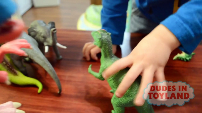 Dinosaur toys fighting and falling by Dudes in Toyland