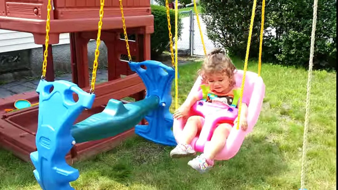 My baby playing with her Little Tykes Swing set!