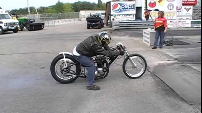 Triumph Drag Bike popping a wheelie at Eddyville, IA Raceway Park