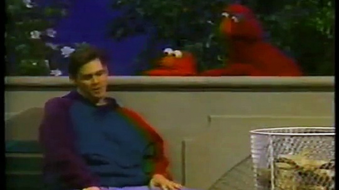 Jim Carrey on sesame street in 1993 showing us the saddest goddamn feet I've ever seen.