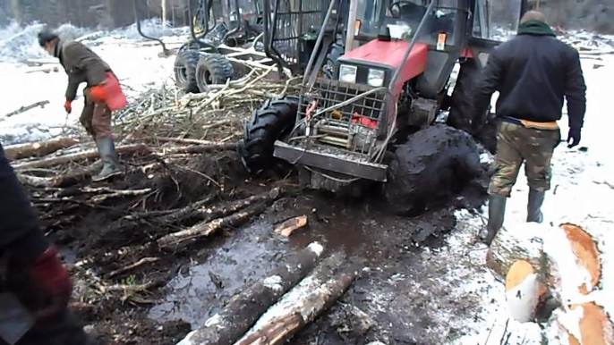 Belarus Mtz 892 forestry tractor stuck in mud, saving with Mtz 1025