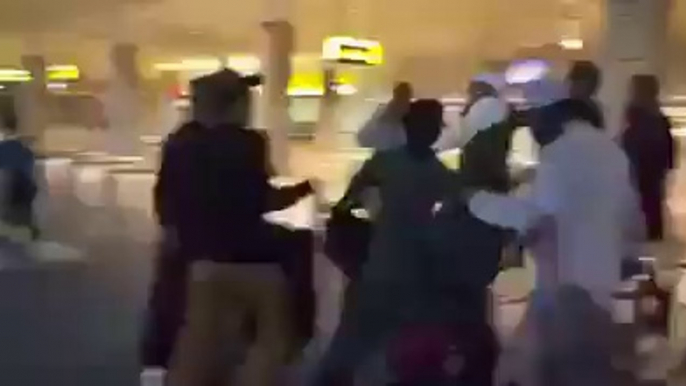 People beating Junaid Jamshed at airport