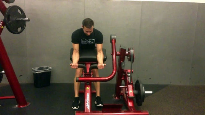 How To Do The Machine Preacher Curls - Male Fitness Training Video - FxFitness.ca