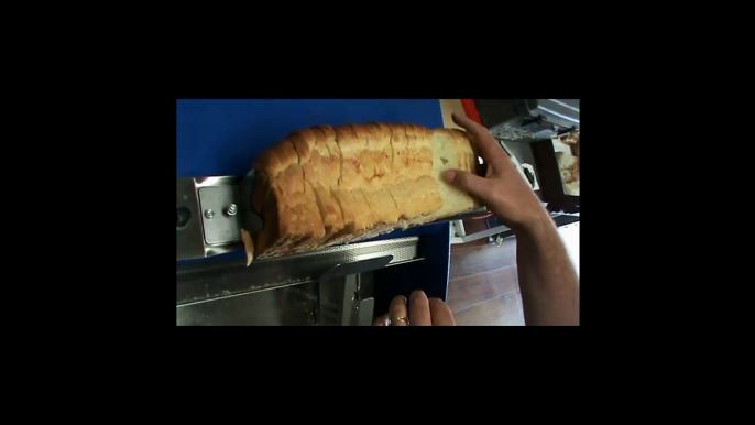 Variable slice thickness bread slicer from Vanrooy Machinery - Wabama
