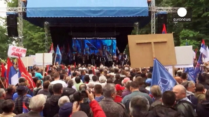 Divided Bosnian Serbs protest for and against the government