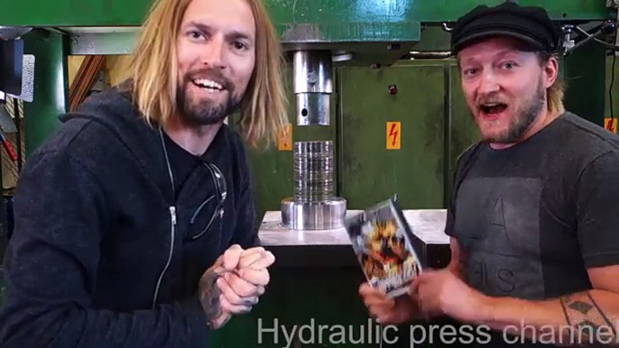 Crushing DVDs for dudesons with hydraulic press