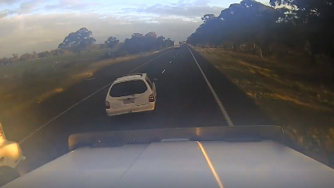 Truck Driver Films Terrifying Near Miss With Overtaking Car