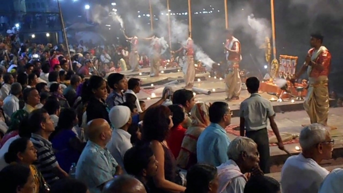 Elaborate Ceremony Along With Fire And Smoke Along The Ganges River