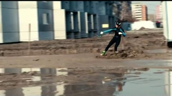 Man surfs on the sea of mud