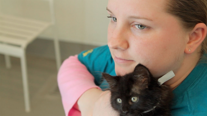 Young Woman With Autism Finds The Confidence to Speak Through Love of Black Cats