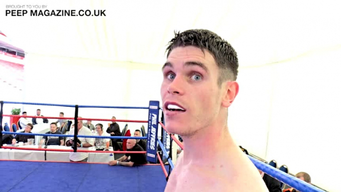 PRO BOXER TOMMY WARD CHATS TO PEEP MAGAZINE WHILE REF RECOVERS GUM SHIELD !