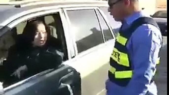 traffic policeman gets a funny reaction from a women