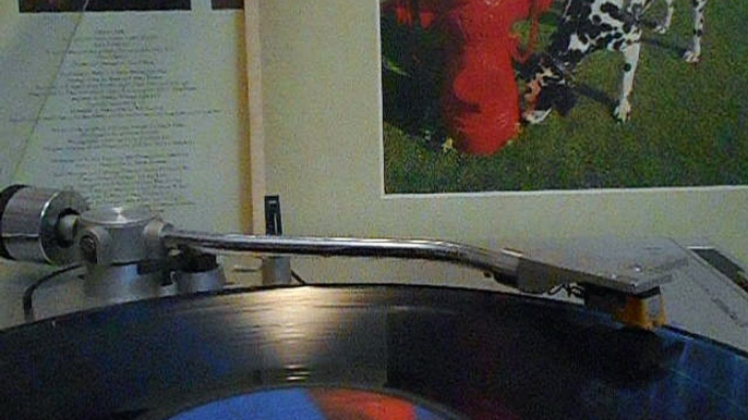 Pioneer turntable playing part of RUSH album Signals