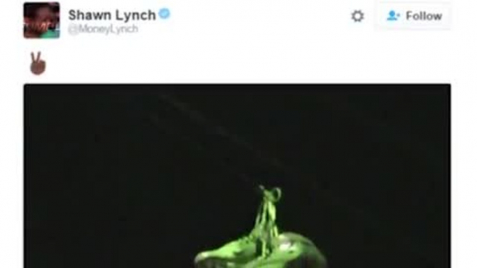 Marshawn Lynch Nearly RUN OVER by Bus While Popping a Wheelie on City Street