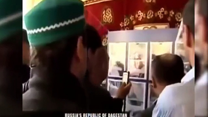 Verses Of Quran On A Russian Baby Body