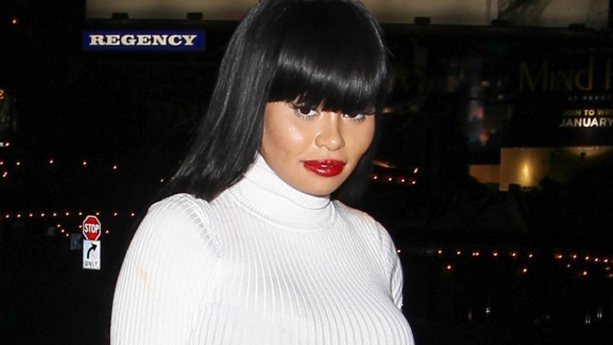 Blac Chyna Caught 'Cozying Up' To A Mystery Man!