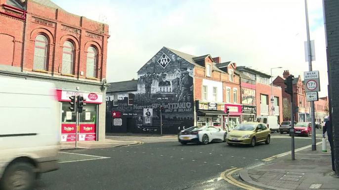 In Belfast, street art battles community rifts