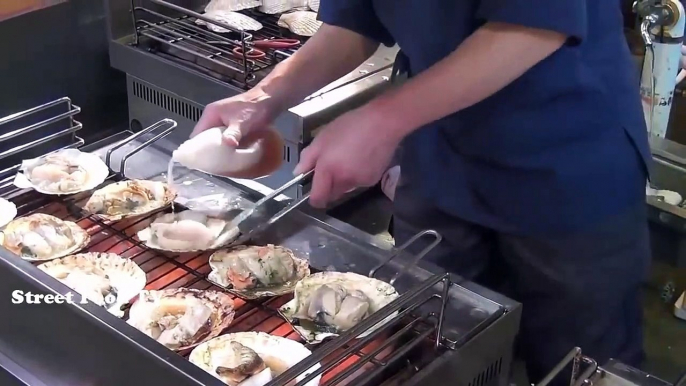 Japanese street food is cooked by the Japanese abalone - seafood delicious lobster