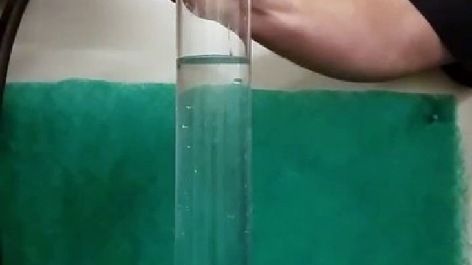 Fast Spinning Golf Ball Dropped in Water in Slow Motion