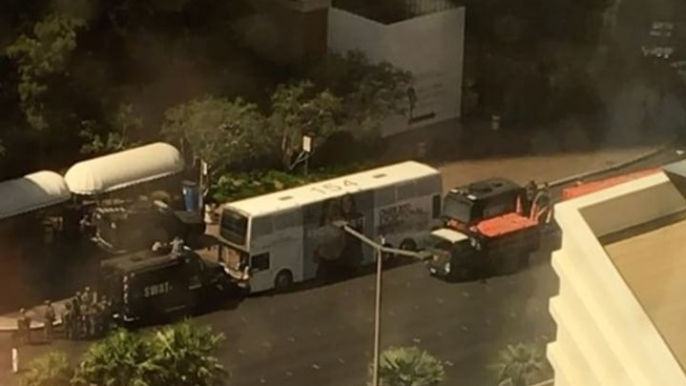 Small Explosion Seen as Las Vegas Shooting Suspect Cornered on Bus by SWAT