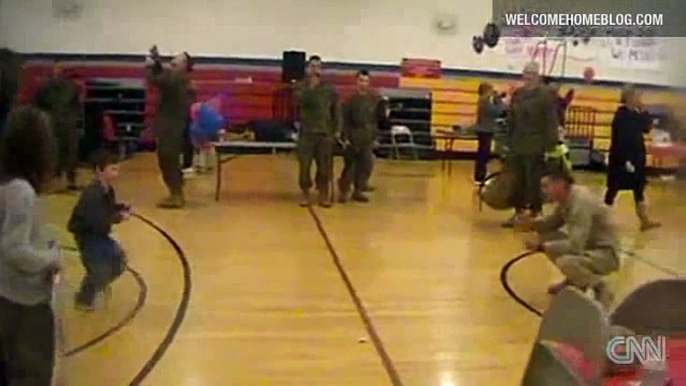 A boy with cerebral palsy walks to his Marine dad for the first time