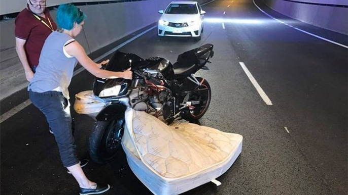 motorcyclist in australia crashes with a mattress