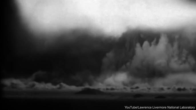 Terrifying archive footage from the 1950s shows mushroom clouds burst into the sky over Nevada and the Pacific Ocean dur