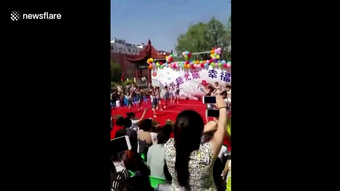 Terrifying moment scenery collapses on children during school show