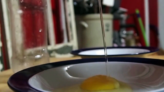 Separate egg yolks with a bottle of water