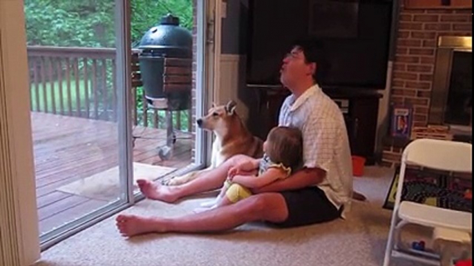 Baby And Daddy Teach Dog To Howl