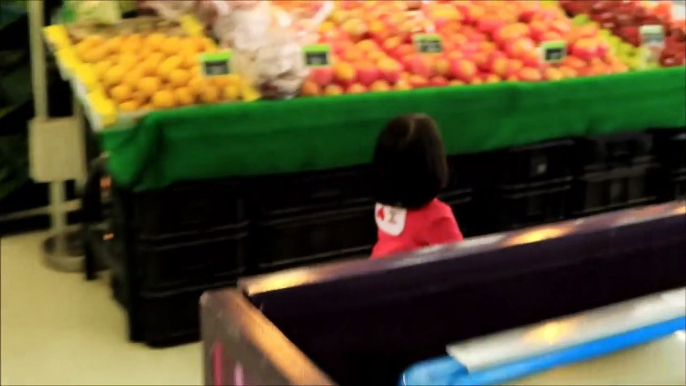 Baby Doing Grocery Shopping at Supermarket with Toy Shopping Cart - Donna The E