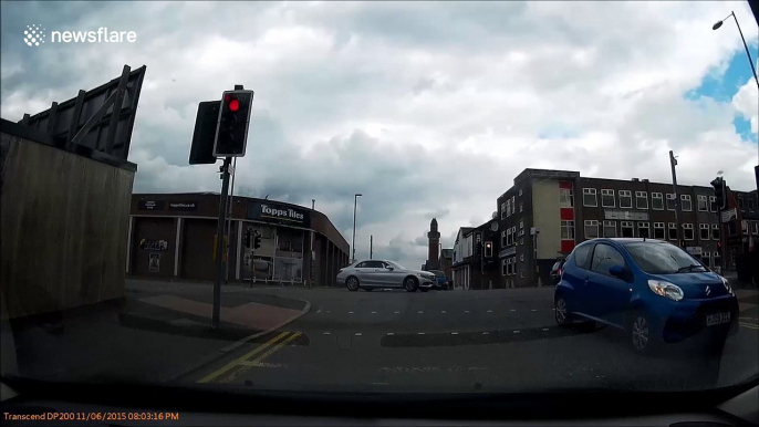 Cyclist flips in the air when hit by car in Manchester