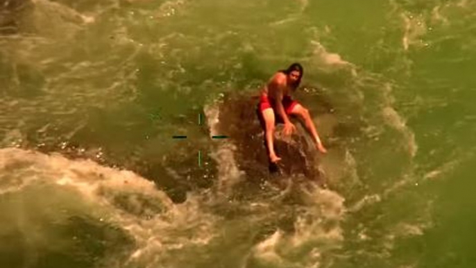 California Highway Patrol Chopper Rescues Swimmer Stuck on Rock in Raging River