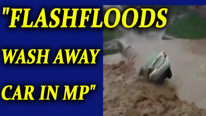 Madhya Pradesh rain : Car washed away in heavy rainfall | Oneindia News