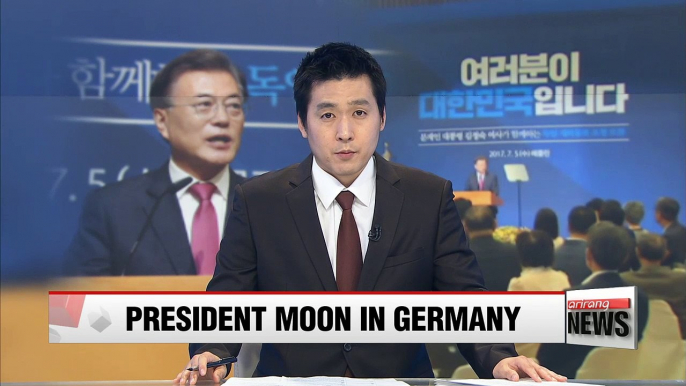 President Moon arrives in Germany, encourages Korean community