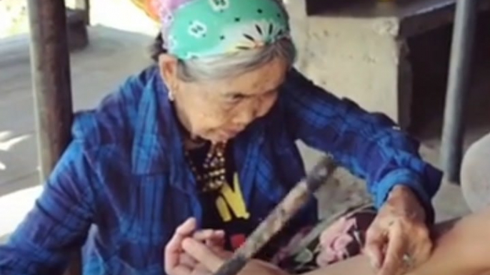 This 100-year-old woman is the last living hand-tap tattoo artist [Mic Archives]