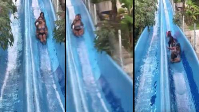 Two Girls Stuck In The Middle Of A Waterslide Cause Painful Crash