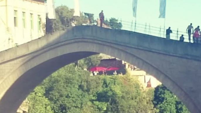 Participants Jump Off Mostar Old Bridge During 451st Diving Competition