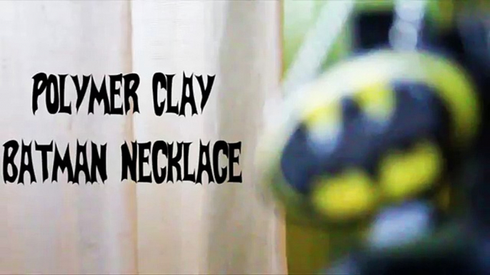 Homme chauve-souris argile collier polymère Batarang