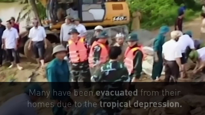 Vietnam floods and landslides leave dozens dead